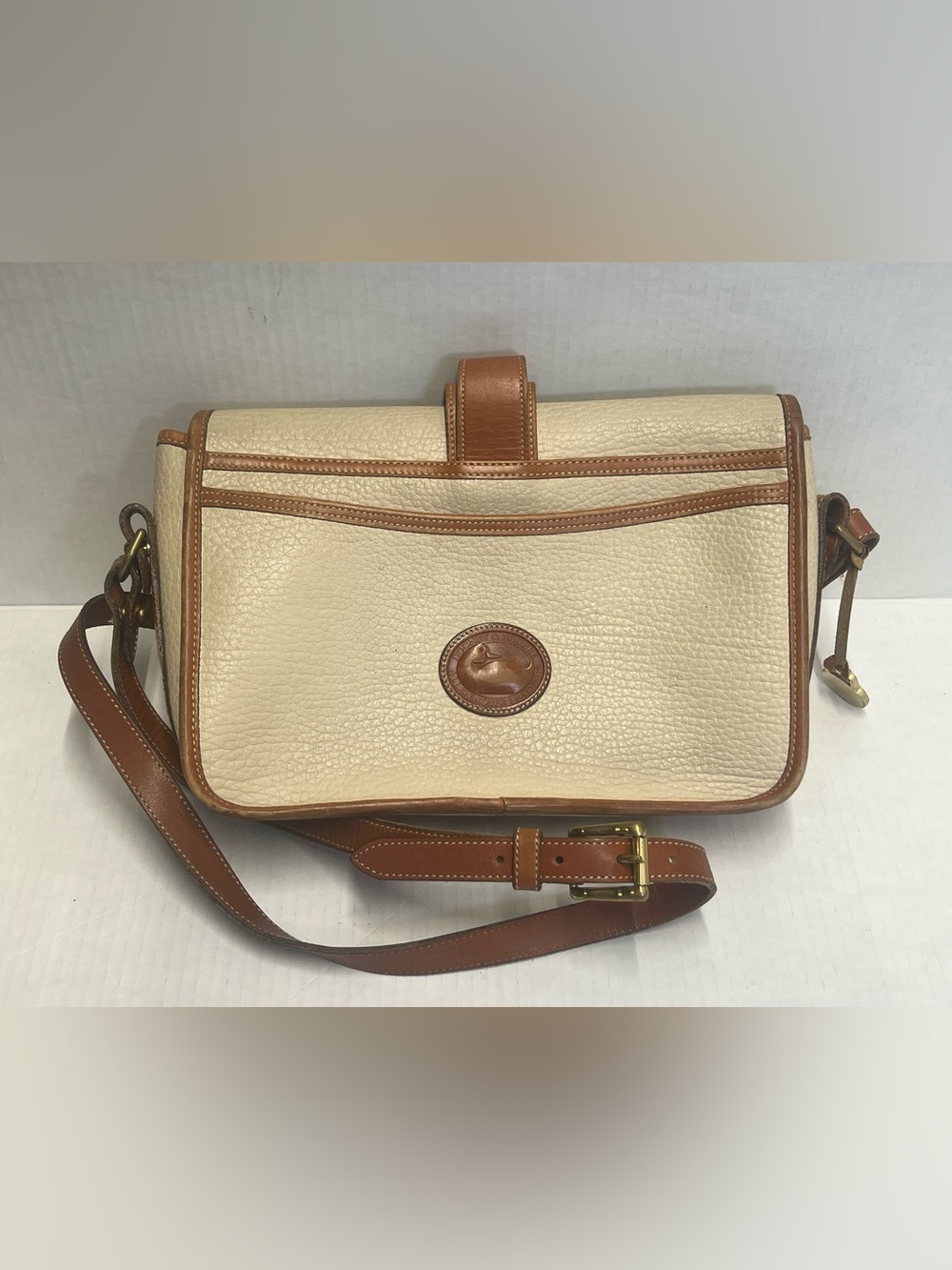 Dooney & Bourke Cream and Brown Pebbled Leather Crossbody